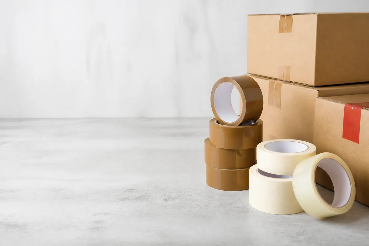 Packaging tape rolls and shipping boxes ready for dispatch